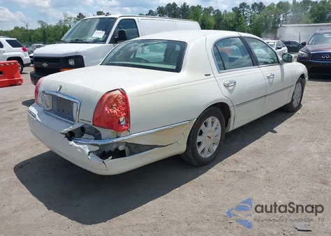 2004 Lincoln Town Car Ultimate из США, поврежденный, VIN 1LNHM83W04Y604592